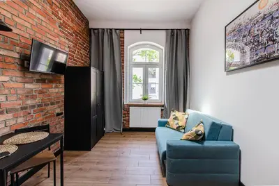 Telewizja i/lub zestaw kina domowego w obiekcie 9a Loft City Apartment