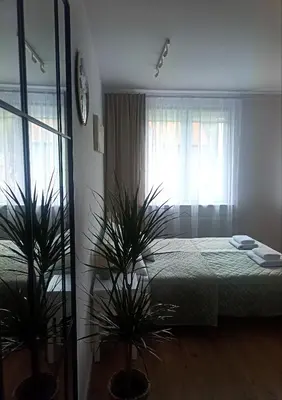 Łóżko lub łóżka w pokoju w obiekcie Słoneczne studio