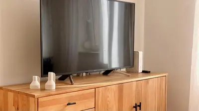 Telewizja i/lub zestaw kina domowego w obiekcie Apartament Mariański
