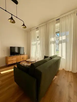 Telewizja i/lub zestaw kina domowego w obiekcie Apartament Mariański
