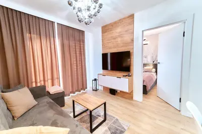 Telewizja i/lub zestaw kina domowego w obiekcie LAGUNA Apartament Polanica Residence 39 SPA