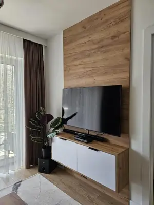 Telewizja i/lub zestaw kina domowego w obiekcie LAGUNA Apartament Polanica Residence 39 SPA