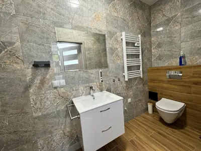 Łazienka w obiekcie Słoneczne pokoje nad jeziorem Nyskim