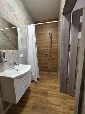 Łazienka w obiekcie Słoneczne pokoje nad jeziorem Nyskim