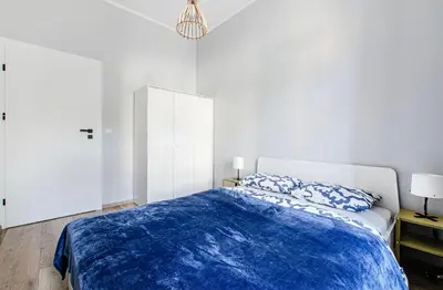 Łóżko lub łóżka w pokoju w obiekcie Loft 2 Centre Apartment