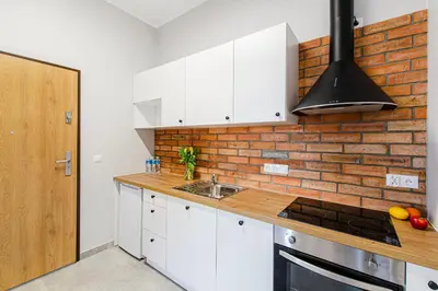 Kuchnia lub aneks kuchenny w obiekcie Loft 2 Centre Apartment