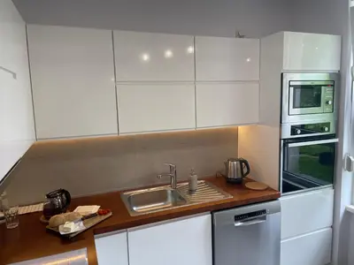Kuchnia lub aneks kuchenny w obiekcie Apartament - jak w domu - 130m2 z Tarasem i ogródkiem