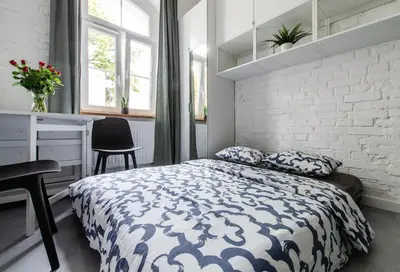 Łóżko lub łóżka w pokoju w obiekcie 8b City Loft