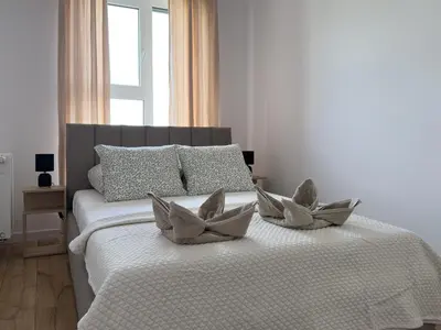 Łóżko lub łóżka w pokoju w obiekcie Legnicka Residence 36