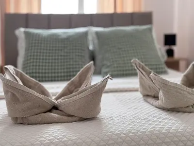 Łóżko lub łóżka w pokoju w obiekcie Legnicka Residence 36