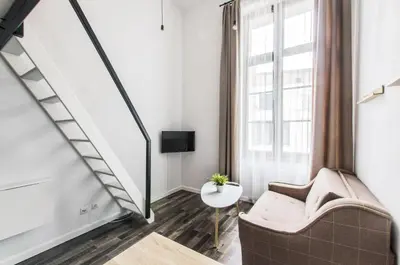 Telewizja i/lub zestaw kina domowego w obiekcie Indigo 2 Apartment z antresolą