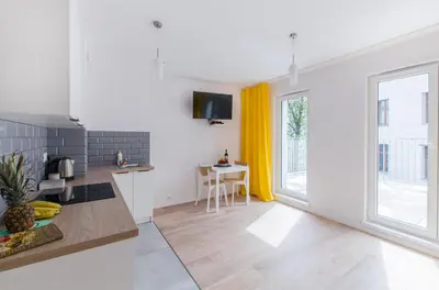 Kuchnia lub aneks kuchenny w obiekcie Yellow Apartment z Tarasem