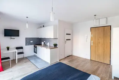 Kuchnia lub aneks kuchenny w obiekcie Red Apartment z Tarasem