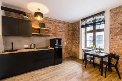 Kuchnia lub aneks kuchenny w obiekcie Loft 5 in a city centre