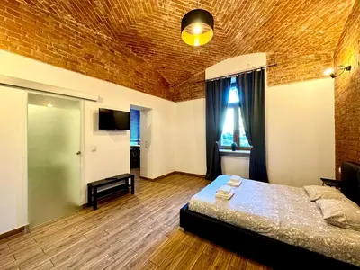 Łóżko lub łóżka w pokoju w obiekcie Loft 6 w centrum miasta