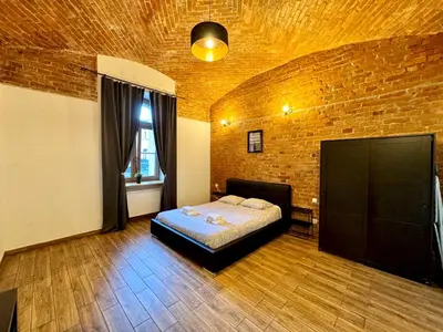 Łóżko lub łóżka w pokoju w obiekcie Loft 6 w centrum miasta