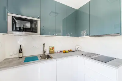 Kuchnia lub aneks kuchenny w obiekcie Teal Apartment- wifi parking 15 min od Rynku