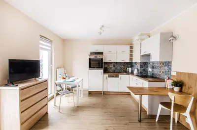 Kuchnia lub aneks kuchenny w obiekcie Orange Studio Cozy & New Apartment near Rynek