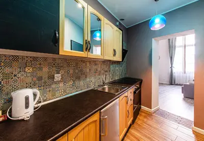 Kuchnia lub aneks kuchenny w obiekcie Klimatyczny Indigo Apartment w pięknej kamienicy