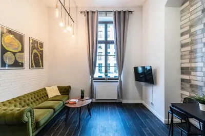 Telewizja i/lub zestaw kina domowego w obiekcie Apartament nr 6 z antresolą