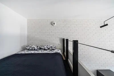 Łóżko lub łóżka w pokoju w obiekcie Apartament nr 6 z antresolą