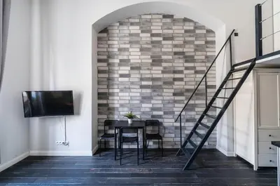 Telewizja i/lub zestaw kina domowego w obiekcie Apartament nr 6 z antresolą