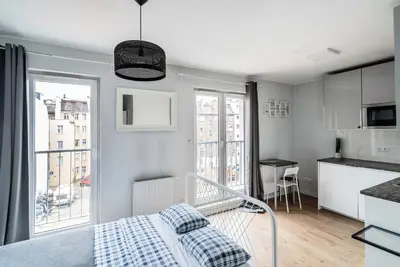 Łóżko lub łóżka w pokoju w obiekcie Teal 2 Apartment
