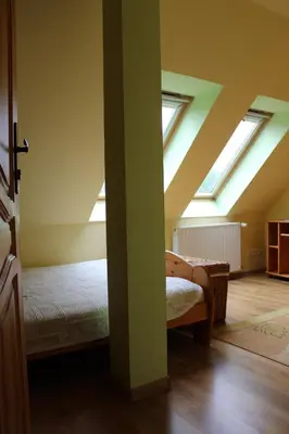 Łóżko lub łóżka w pokoju w obiekcie Pensjonat EL-TAN - nocleg na wsi z WI-FI bez TV