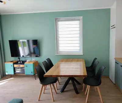 Telewizja i/lub zestaw kina domowego w obiekcie Apartament Szałwiowa Dolina