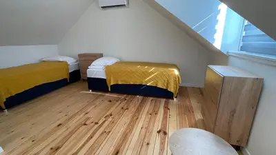 Łóżko lub łóżka w pokoju w obiekcie Dobków 42 Hill