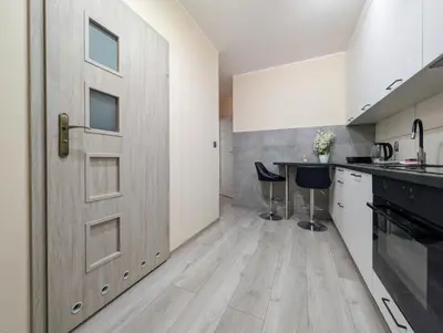 Kuchnia lub aneks kuchenny w obiekcie Jagodno Comfort Apartment by BookingHost