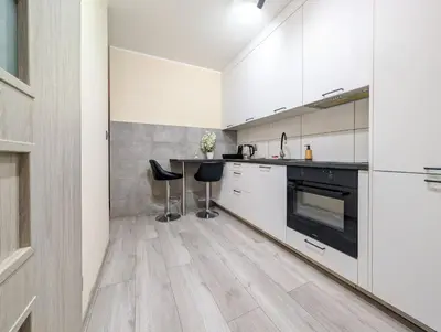 Kuchnia lub aneks kuchenny w obiekcie Jagodno Comfort Apartment by BookingHost