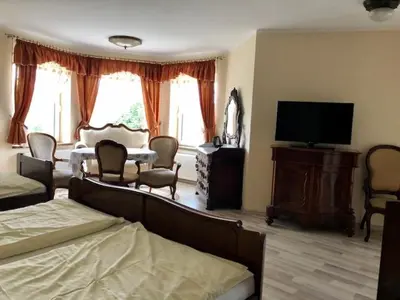 Telewizja i/lub zestaw kina domowego w obiekcie Willa Na Wzgórzu Wandy