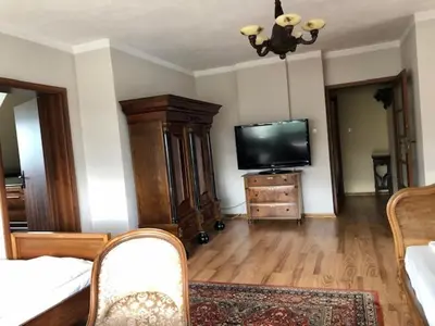 Telewizja i/lub zestaw kina domowego w obiekcie Willa Na Wzgórzu Wandy
