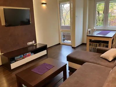 Telewizja i/lub zestaw kina domowego w obiekcie Apartament Gądów Mały