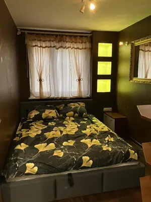 Łóżko lub łóżka w pokoju w obiekcie Apartament Gądów Mały