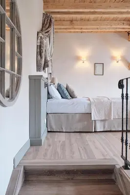 Łóżko lub łóżka w pokoju w obiekcie Pałac Kamieniec