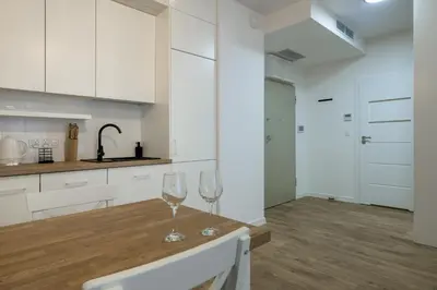 Kuchnia lub aneks kuchenny w obiekcie RentPlanet - Apartamenty Bernardyńska