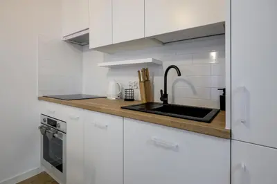 Kuchnia lub aneks kuchenny w obiekcie RentPlanet - Apartamenty Bernardyńska