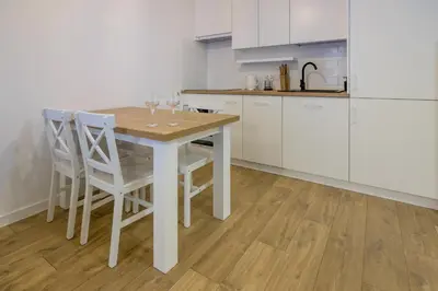 Kuchnia lub aneks kuchenny w obiekcie RentPlanet - Apartamenty Bernardyńska