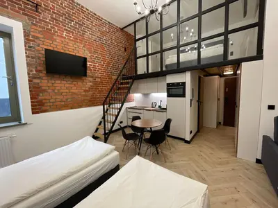 Łóżko lub łóżka w pokoju w obiekcie Apartament Deluxe 1 rynek 350 m