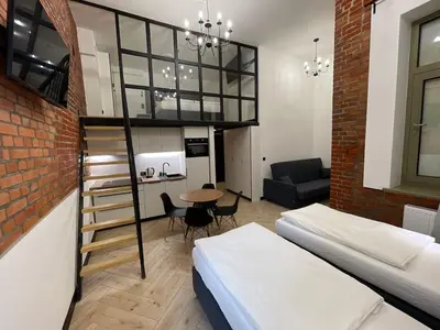 Łóżko lub łóżka w pokoju w obiekcie Apartament Deluxe 1 rynek 350 m