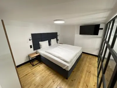 Łóżko lub łóżka w pokoju w obiekcie Apartament Deluxe 1 rynek 350 m
