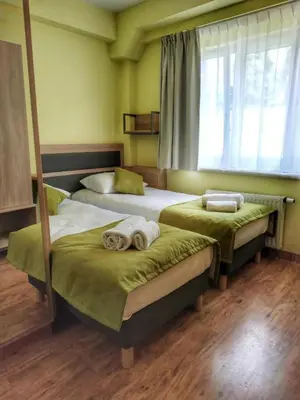 Łóżko lub łóżka w pokoju w obiekcie Sandacz Otmuchów