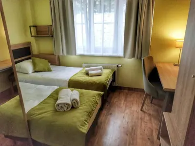 Łóżko lub łóżka w pokoju w obiekcie Sandacz Otmuchów