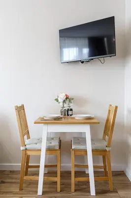 Telewizja i/lub zestaw kina domowego w obiekcie Central Wroclaw Apartment - Old Town - Swidnicka street