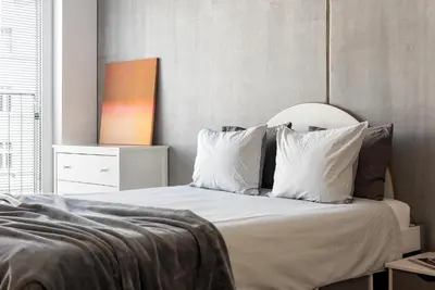 Łóżko lub łóżka w pokoju w obiekcie apartamenty-wroc Kurkowa 14