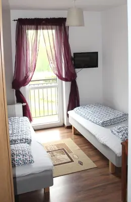 Łóżko lub łóżka w pokoju w obiekcie Villa Valle Verde
