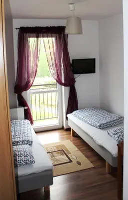 Łóżko lub łóżka w pokoju w obiekcie Villa Valle Verde