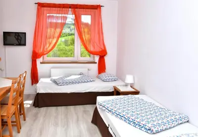 Łóżko lub łóżka w pokoju w obiekcie Villa Valle Verde